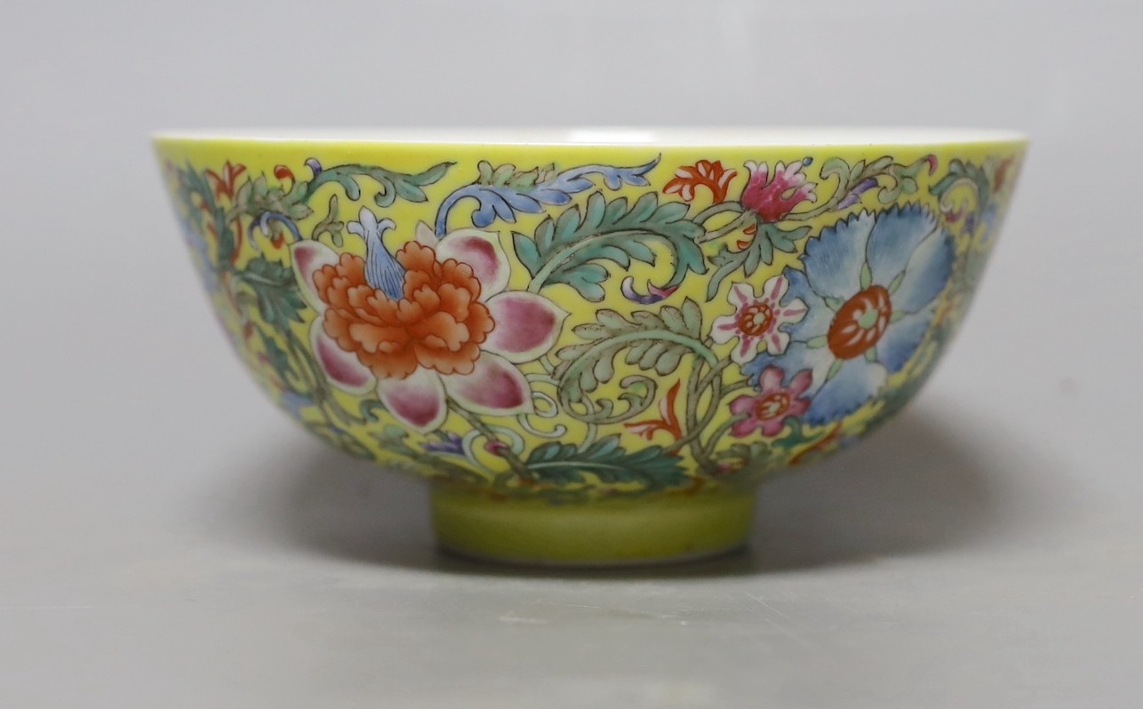 A Chinese yellow ground famille rose floral bowl, 15cm